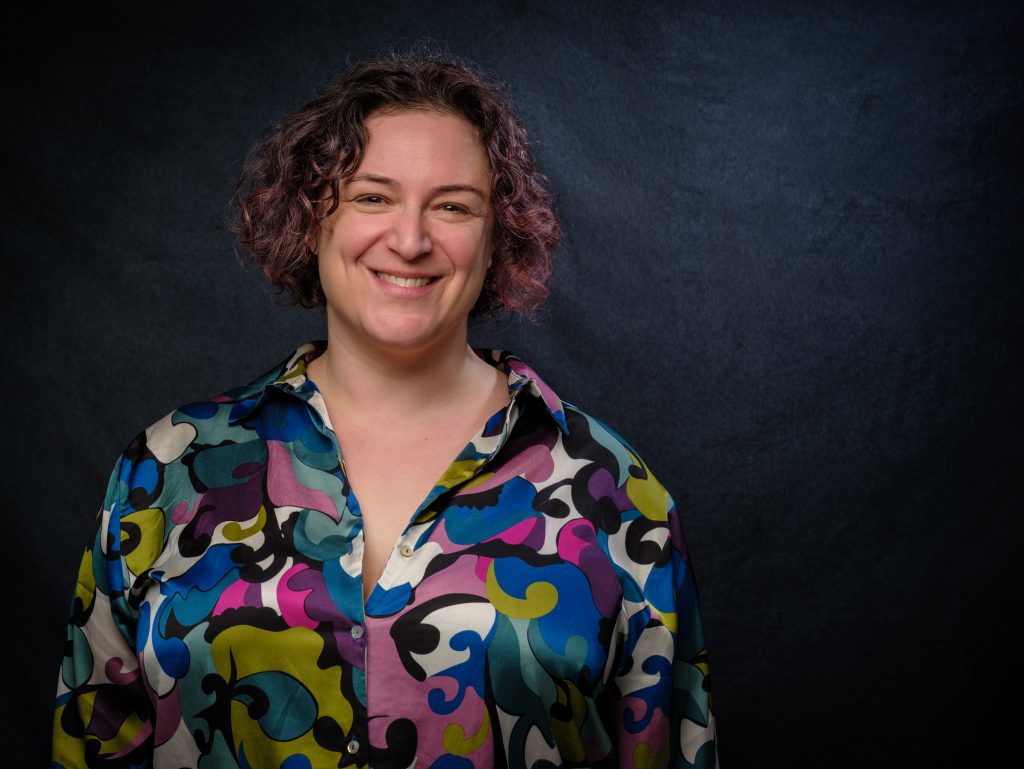 Rebecca smiling and feeling empowered to empower your voice