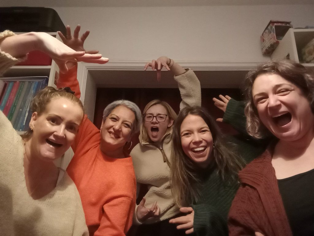 group of women roaring at workshop